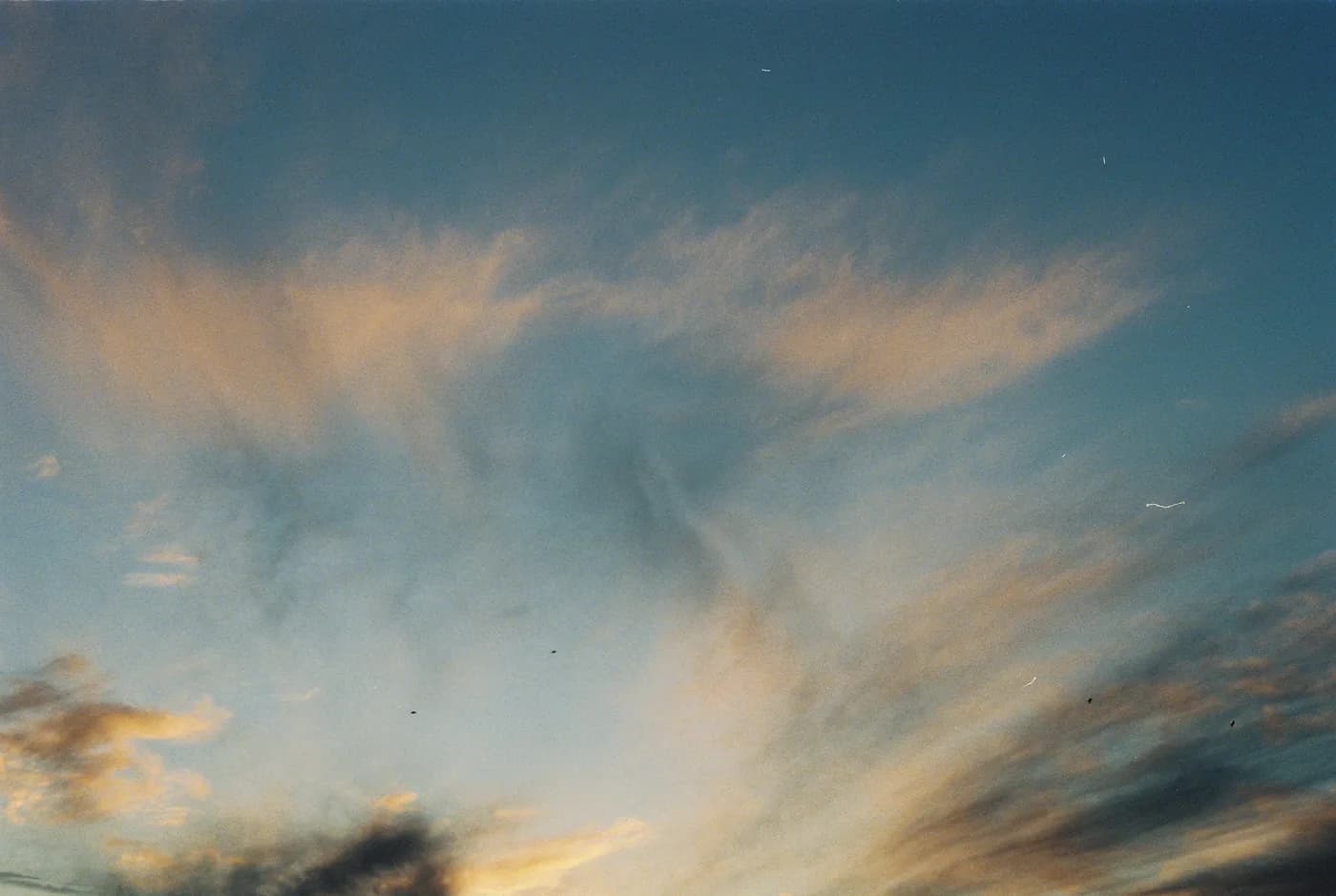 Soft clouds lit by warm evening light